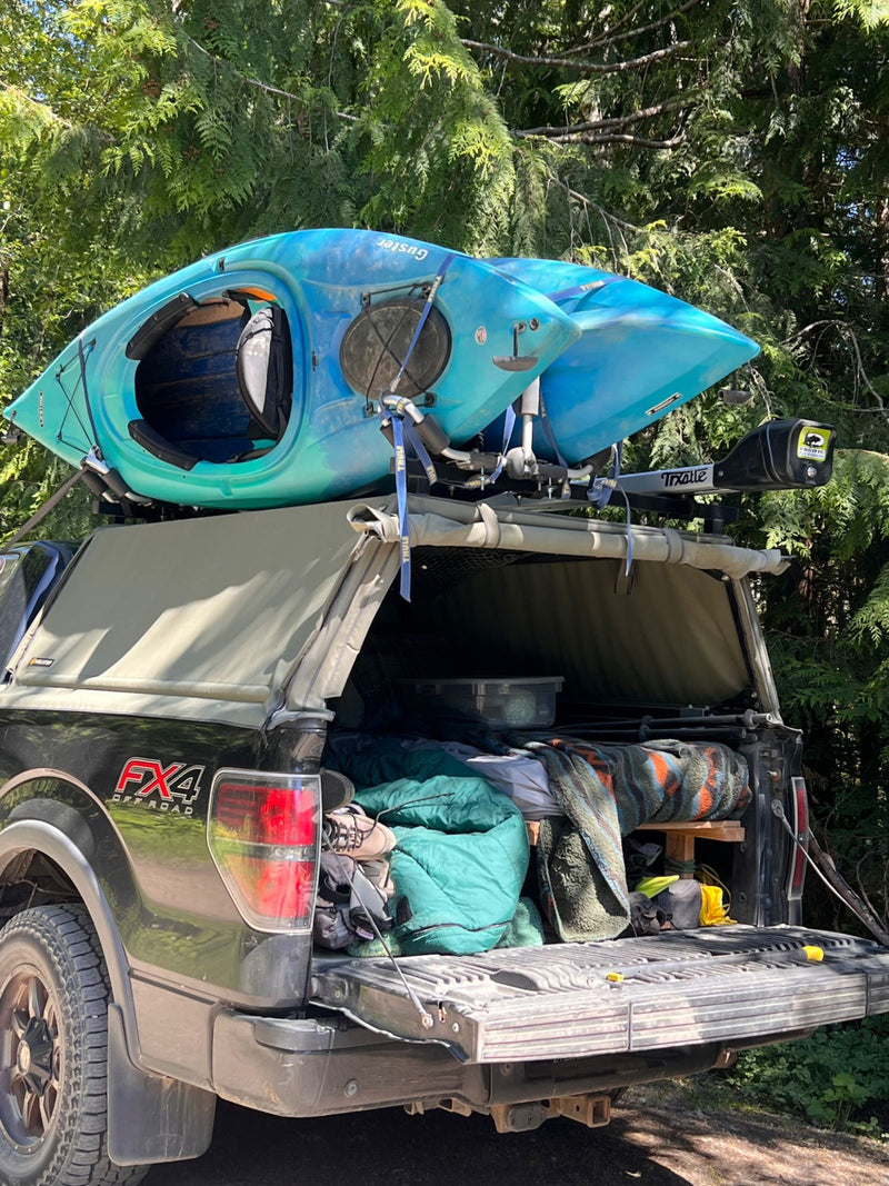 Kayaks up top, dog in back — Brent C.'s Ford F-150 with a WildTop Nomad